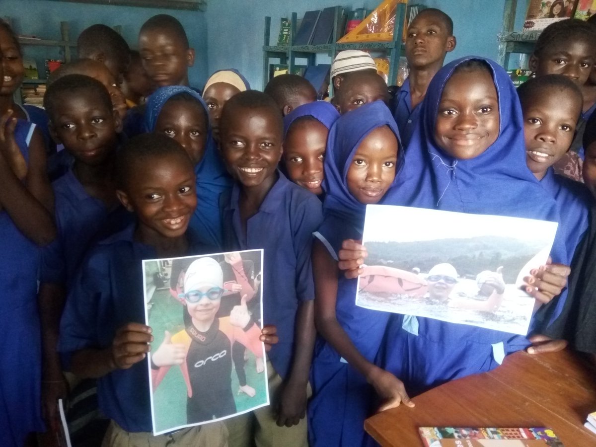 AlansAfrica's tweet photo. @Willesleyschool The Children at #LiverpoolSchool #SierraLeone with photos of Rose doing her #Swim250 in #GreatNorthSwim #Windermere
where she raised ยฃ200 for the "Link School" They are SO proud of her & want to say THANK YOU Rose https://t.co/yq3EIw9W7h
