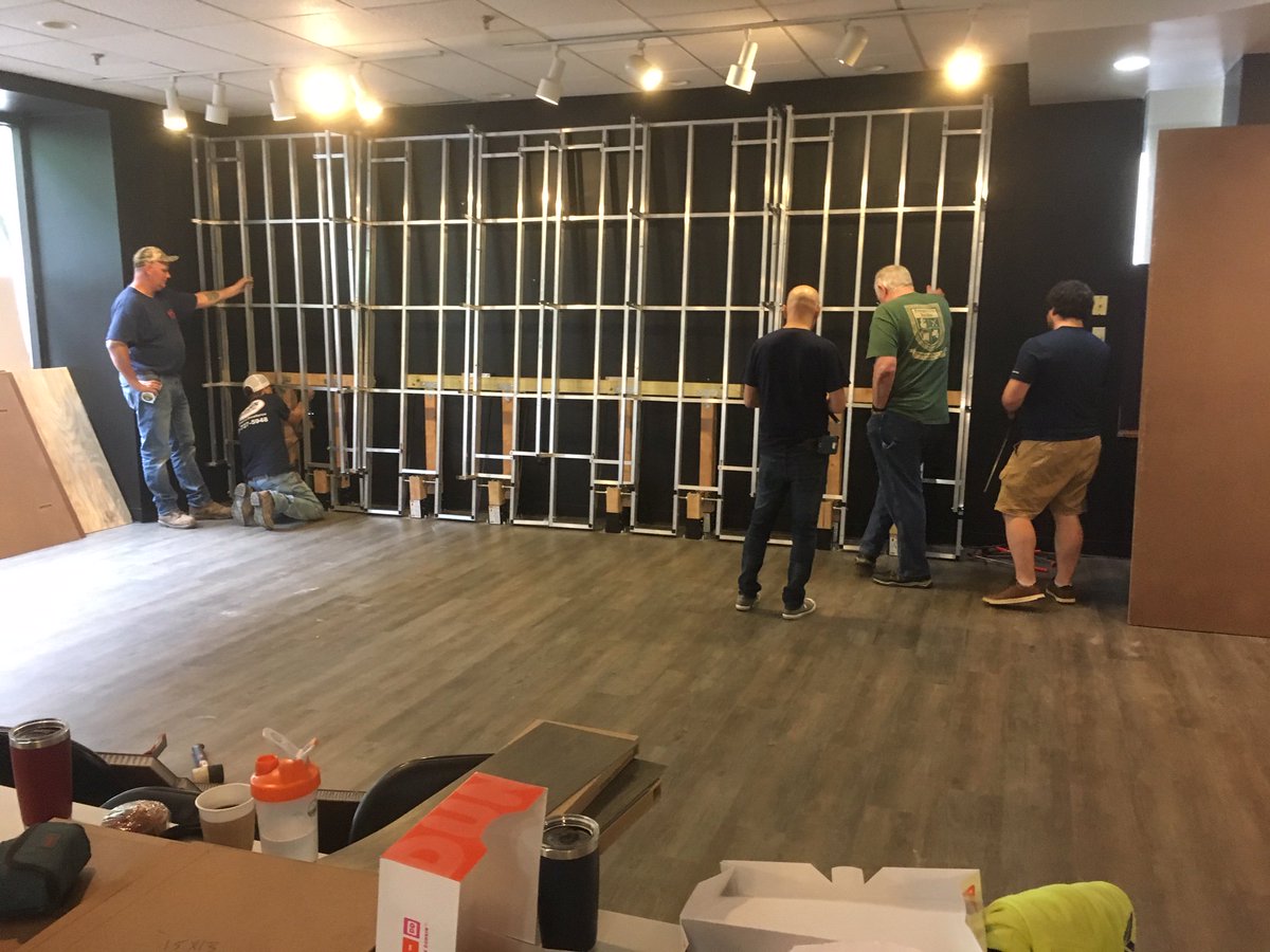 _RITEngineering's tweet photo. ICYMI: Multidisciplinary Design students on Team MUSIC, in collab with RIT Museum Studies and Interior Design students, had their Murphy Stage (a transformable stage that can be stowed in a vertical position) installed at @RocHallofFame! #TigerPride #RMHF https://t.co/LtkpyHbs3P
