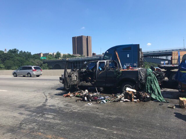 FDNY's tweet photo. Our members, without hesitation donated their personal footwear so they would have something to wear- #FDNY BC Kevin Murphy, #Battalion13 while on the scene of a vehicle fire on the Hamilton Bridge this afternoon. Read more: https://t.co/7rVnzwAJoo https://t.co/DxjlDQhwEL