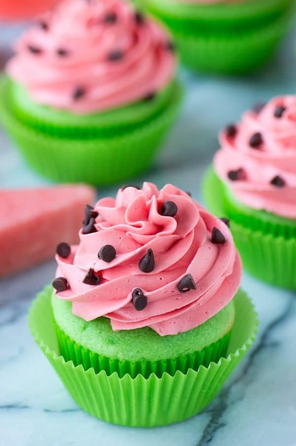 A packet of Kool-Aid mix added to buttercream frosting gives these cupcakes their vibrant icing!

Mini chocolate chips are the "watermelon seeds." Try making these adorable summertime treats in your apartment kitchen: bit.ly/2MbedYd