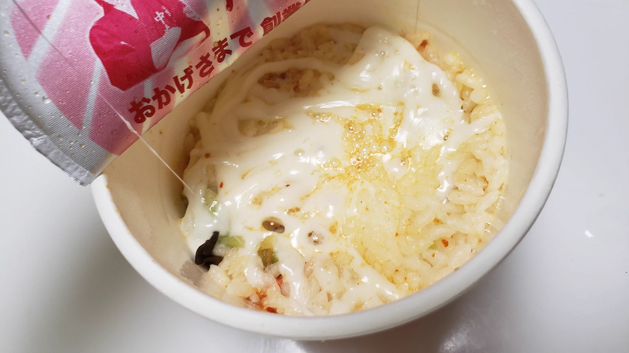 蒙古タンメンの辛旨飯にさけるチーズ一本裂いて入れて混ぜると？めちゃくちゃうまい！