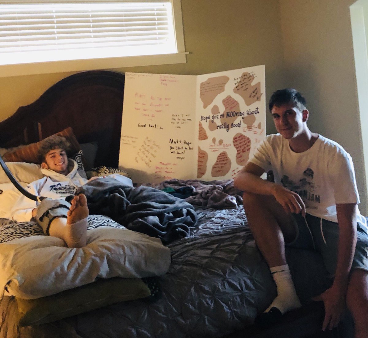 bk_basketball's tweet photo. Straight from Zag Camp the team put together well wishes in a huge card for our teammate fresh outta surgery. Great job Wolt in looking after your recovering guard! #healupmatt #12guys1team #bkway #goknights https://t.co/8r7Wyqi8EK