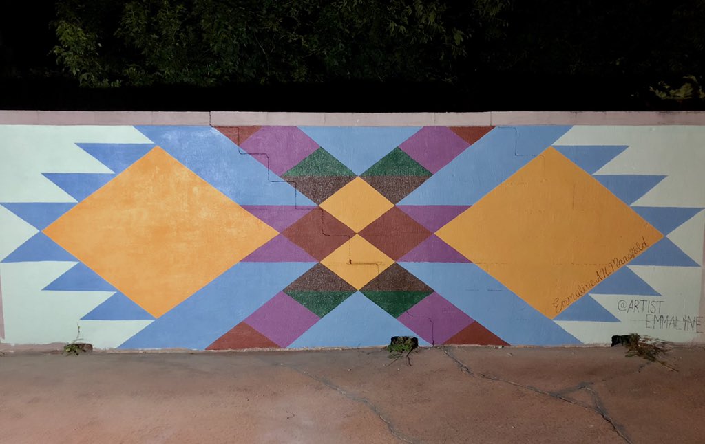 emmaline_austin's tweet photo. I just completed my life long dream of painting a mural in my hometown Pembroke, NC. This doesn’t even feel real. Like, this really just happened. https://t.co/xeduRlbC9V