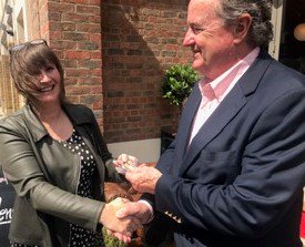 Construct_arium's tweet photo. #FF- Friday Feelgood: Julia Stevens, CEO was honored to receive this week, the prestigious "Coin" from Steve Rogers @TAMUCOSC in recognition of the strong collaborative partnership and shared values. https://t.co/WIelDw2RA0