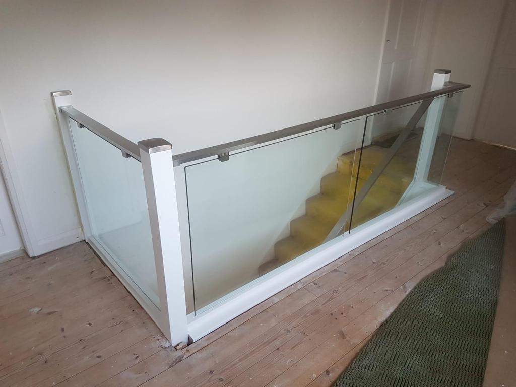 Adding a little steel and glass can really open your staircase up and allow the light to flood in! #modernstaircase #staircaserenovation #jarrodsstaircases