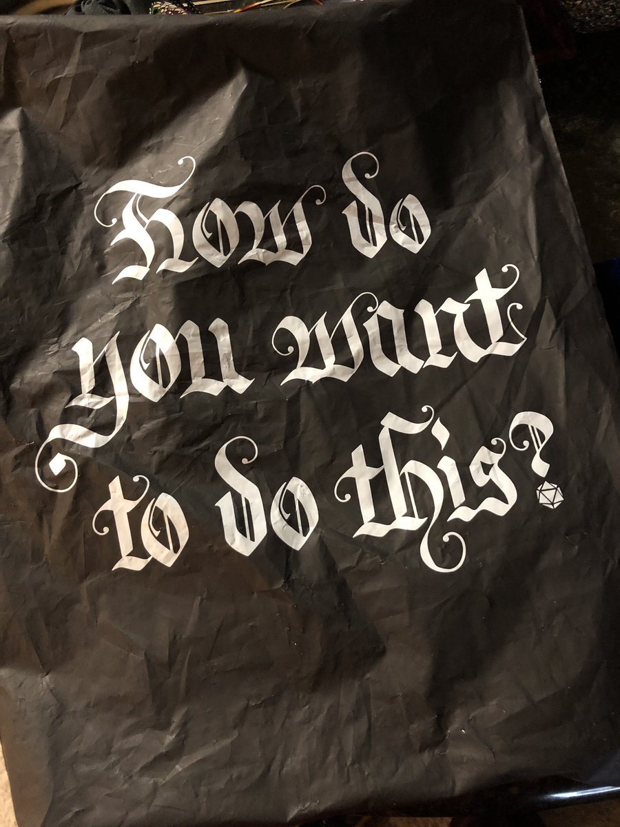 Liisabelle's tweet image. Y’all. Props on this awesome packaging. This is what my mandala shirt came in. Peep that sweet @DevenRue map art! And that font. #fontnerd #CriticalRole #hurdeedurdeedurdis
