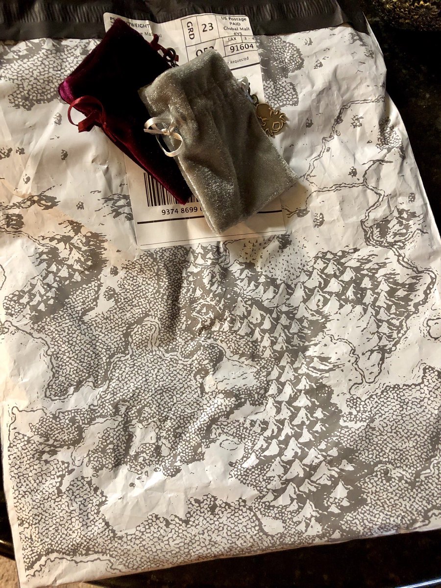Liisabelle's tweet image. Y’all. Props on this awesome packaging. This is what my mandala shirt came in. Peep that sweet @DevenRue map art! And that font. #fontnerd #CriticalRole #hurdeedurdeedurdis