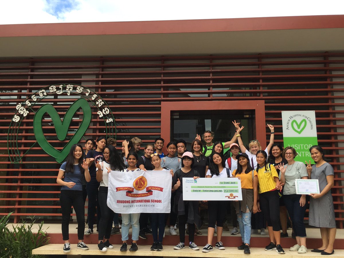 JisCambodiaTrip's tweet photo. A humbling visit to@angkorhospital We handed over our donation money from our fundraising efforts this year -green hearts, Cambodia Carnival, cookies, ice creams and floats #JISChallenges #JISBrunei #JISCommunity #JISMYFamily #JISSeniors https://t.co/uaplOcfeGG