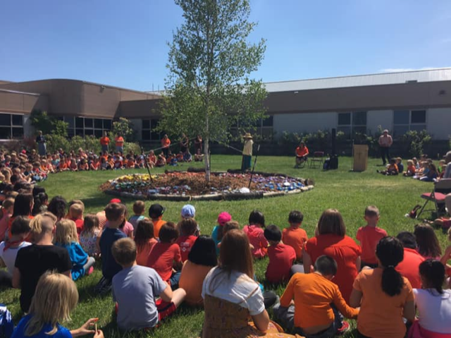 NCTR_UM's tweet photo. Students and Elders gathered at Holy Cross Elementary School for an Elder Reconciliation Ceremony, the students presented their Reconciliation Rock Garden. Each grade was given a section that was connected to a traditional Grandfather teaching. #TruthB4 #Reconciliation https://t.co/C1ELYq5w5R