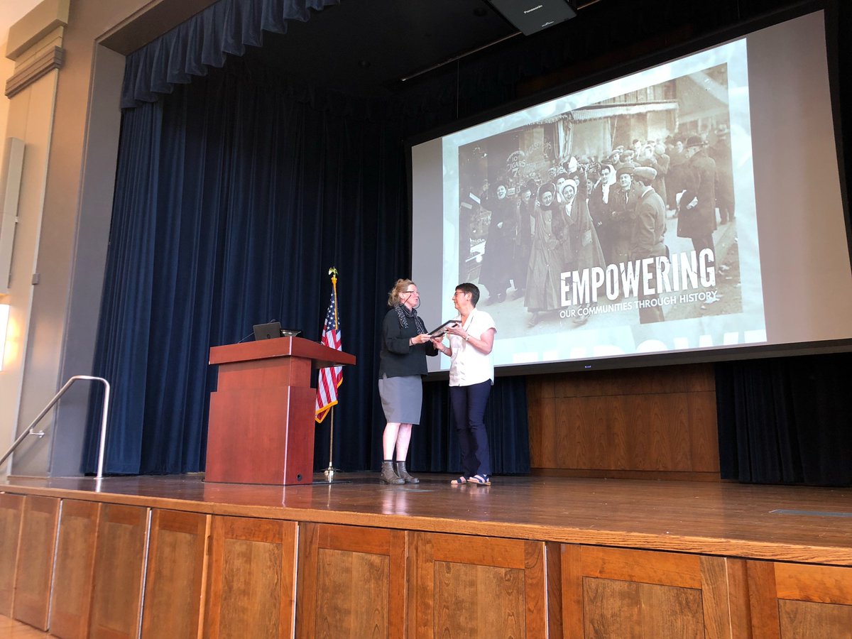 Joanne Riley receiving award
