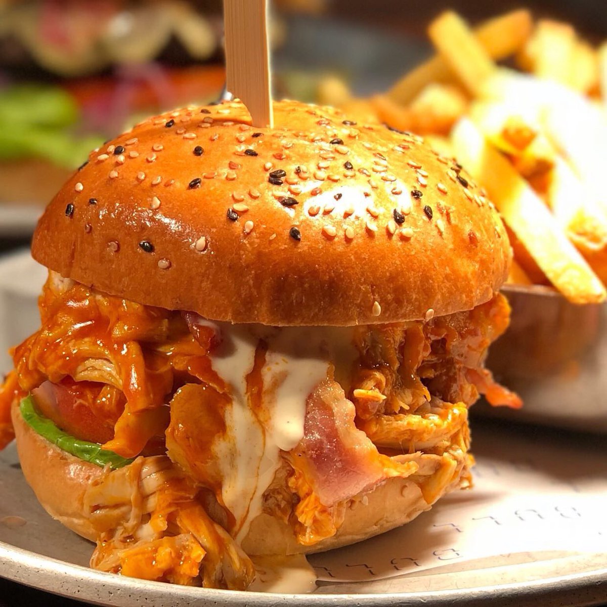 Coqbull_Cork's tweet photo. HOT COQ on a wet Friday...perfect if you like it Hot ...🌶 🌶 it’s shredded rotisserie chicken marinated in our Award winning Hot Coq sauce with crispy bacon, habanero mayonnaise, blue cheese dressing, lettuce tomato and onion and served with fries of course #hotcoq #coq https://t.co/sjzl1LYsMD