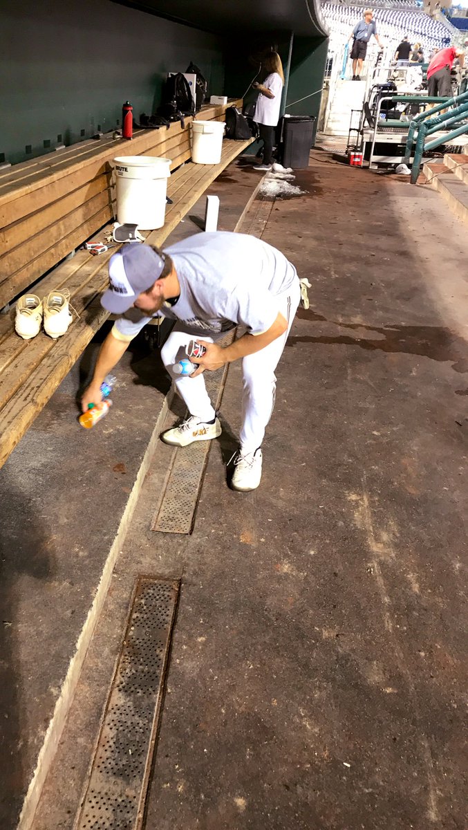 An hour after winning a national title in his last collegiate game.... @Stephen_Scott7 stayed & picked up every piece of trash in our dugout. No one asked him to, & he didn’t see me sneak this picture. He just did what was right. Leaders Eat Last until the end. @VandyBoys
