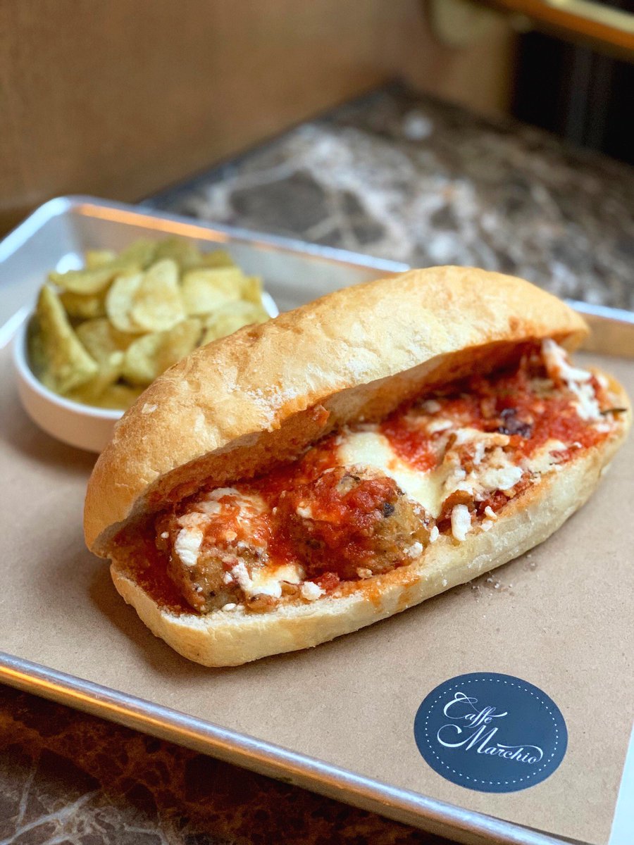 Messy, but sometimes that's exactly what you need. Our Grande Panino with chicken meatballs, olives, and mozarella. Available daily after 3pm. #PassportToRome