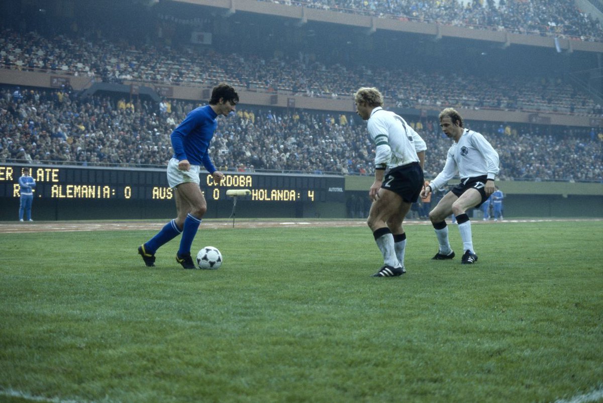 #PaoloRossi tries to escape the guard of West Germany's captain #BertiVogts and #BerndHölzenbein during the Second Phase Group 1 match of the 1978 #WorldCup between Italy and West Germany. @PablitoRossi