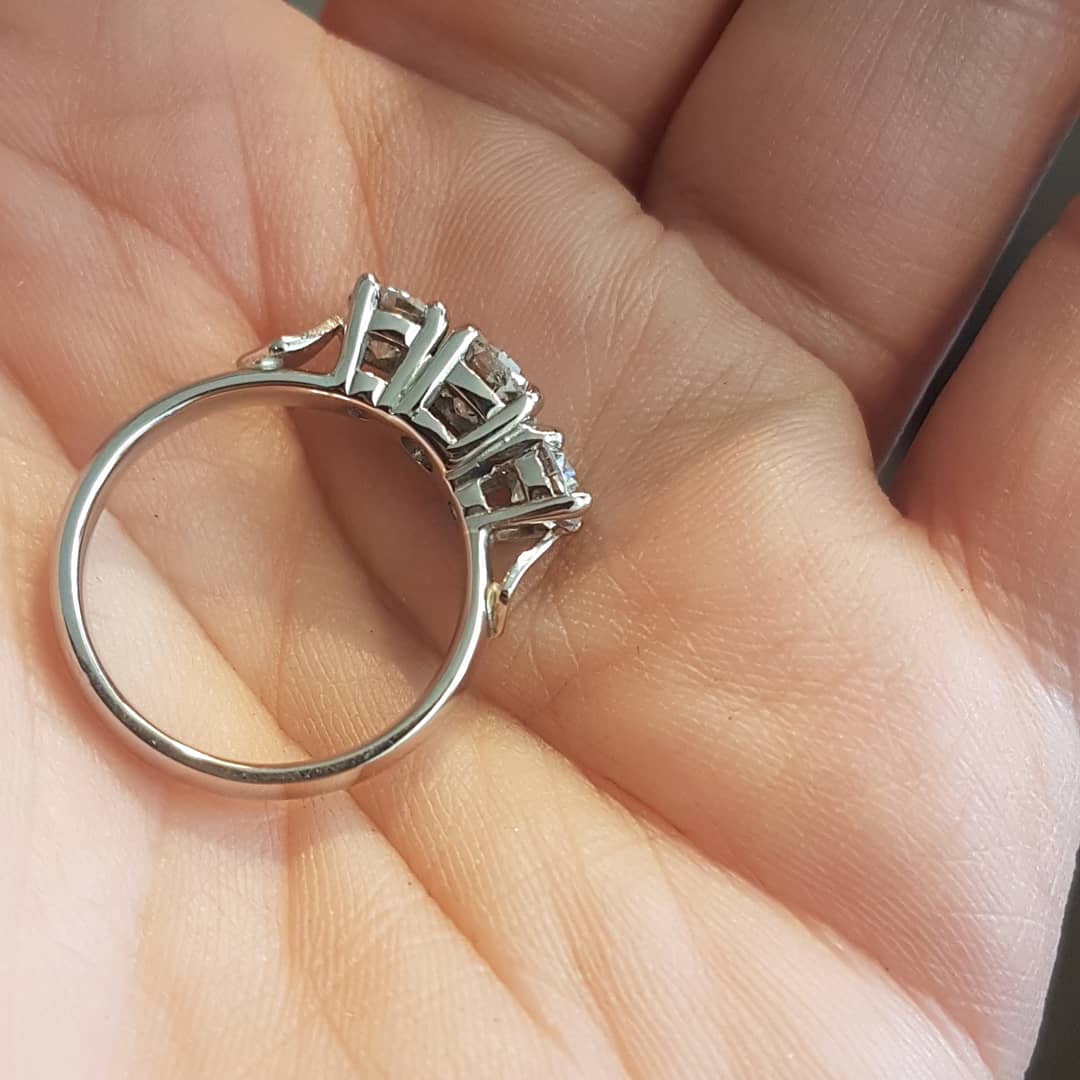 claireallain1's tweet photo. A spot of remodelling went back to its owner today..a mixture of her jewellert plus some heirloom diamonds and a sprinkle of new diamonds #18ctwhitegold #diamonds #europeancut #trilogyring #diamondweddingring #recycled #ethicaljewelry #handmade https://t.co/ryGRs6aRGu