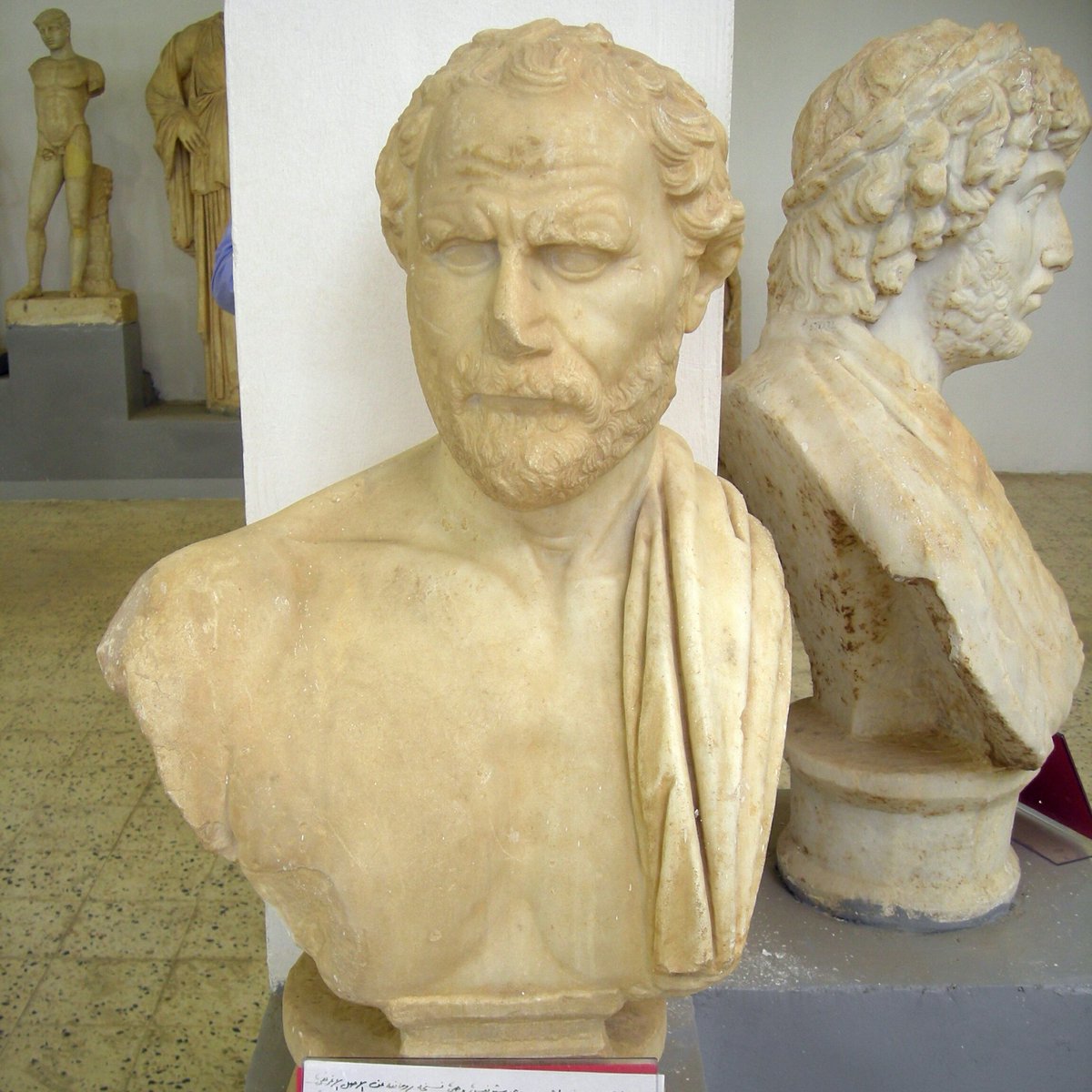 romanarchaeouk's tweet photo. Roman copy of a bust of the Athenian statesman and orator Demosthenes, found in the valley below the agora at Cyrene, Libya. Longinus said Demosthenes perfected to the utmost the tone of lofty speech, living passions, copiousness, readiness, speed #RomanLibya #RomanArchaeology https://t.co/l1JXcA8WTv
