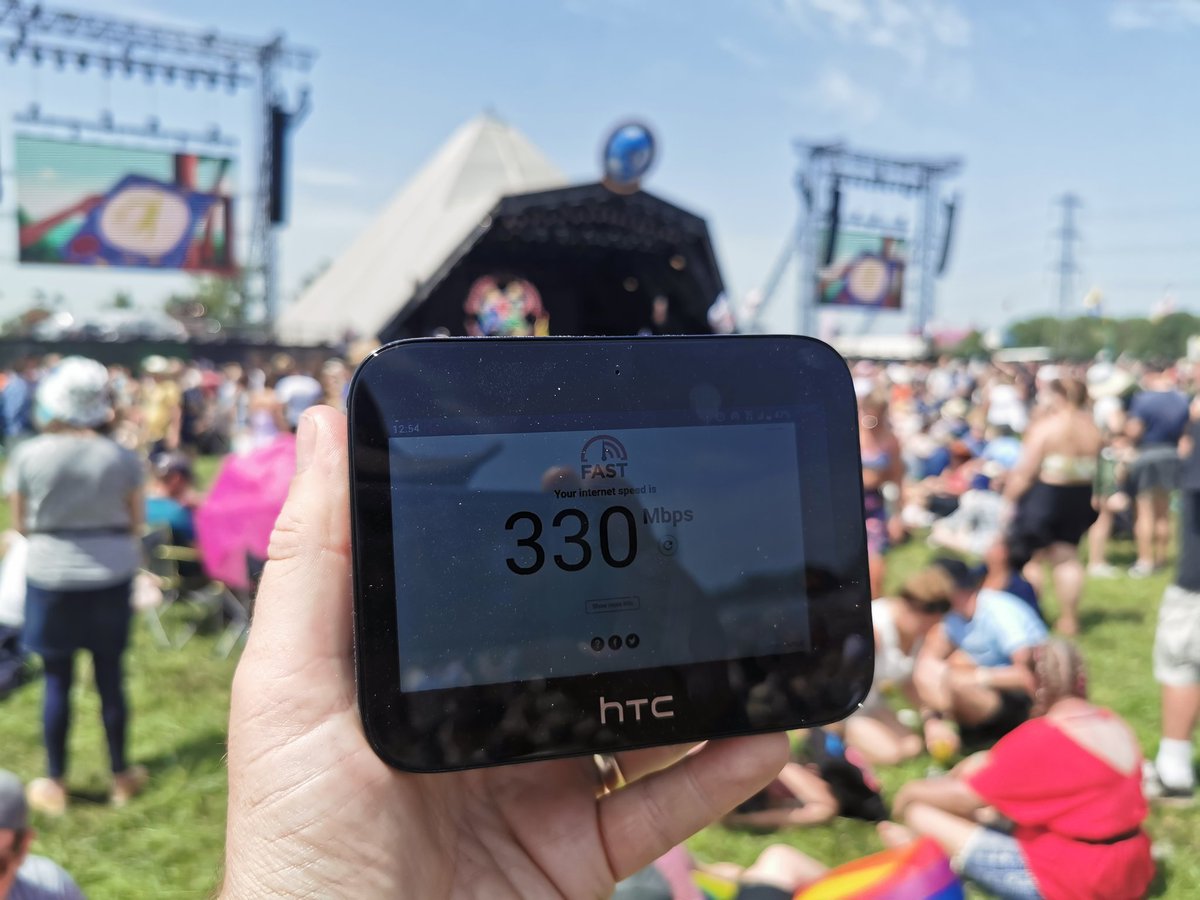 The @HTC 5G Hub (<a href="/Qualcomm/">Qualcomm</a>-powered) is the most useful 5G device I brought to #glastonburyfestival2019. Combination of #4G Cat 20 LTE &amp; 5G where available means it is the <a href="/EE/">EE</a> hotspot everyone around us in the campsite is using! Thanks to @HTC for loaning it to me for the weekend.
