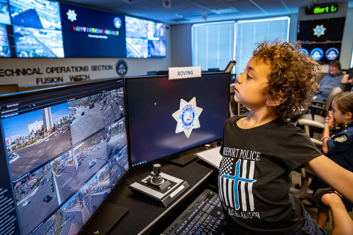 LVMPD's tweet photo. Abigail Arias might be fighting cancer, but she's found an extended family in law enforcement to cheer her on. 
#LVMPD was delighted to have Abigail stop by our HQ campus, where officers surprised her with a 7th birthday celebration. 🎂🎉
#birthdaycakeandbadges #keepupthefight https://t.co/lNVgM1Vx29