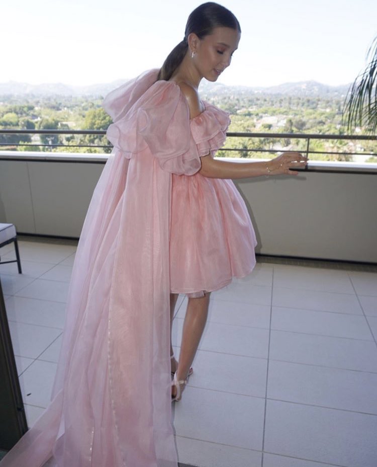 Millie Bobby Brown's Silver Sarong and Pink Ruffle Dress