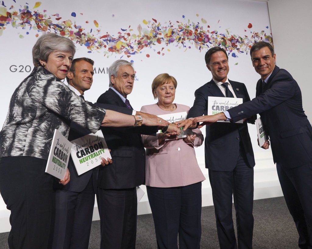 theresa_may's tweet photo. At #G20OsakaSummit I committed to ensuring all UK aid is spent in line with the Paris Agreement and urged world leaders to follow the UK's commitment to cut greenhouse gas emissions to #netzero by 2050. https://t.co/wrDE7WAMgB