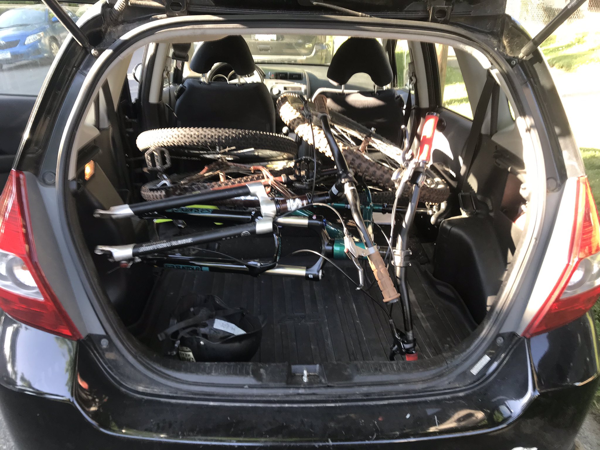 Greta Kaul on X Will it fit in the Honda Fit Two mountain bikes wheel off yep. https t G6HGamnS0i X
