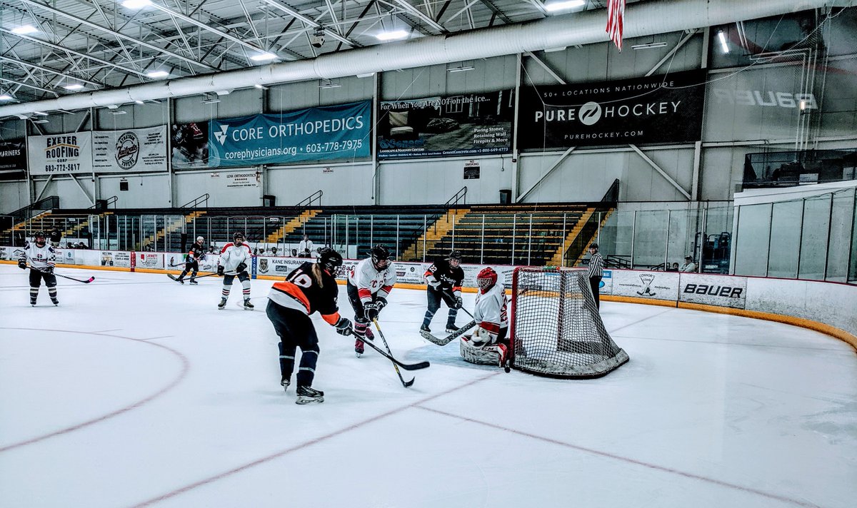 Groomies trying to stuff another one in as they lead 5-1 against Dover Red at the end of the third