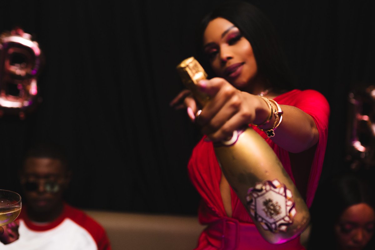 Bonang's tweet image. High on my own supply. 🥂🍾💕