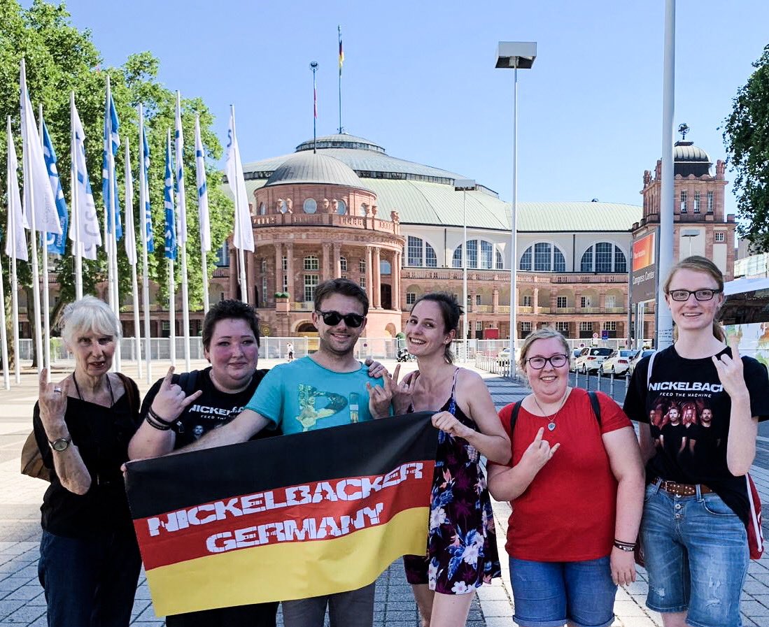 NBFansGermany's tweet photo. Hi @Nickelback ! Greetings from Germany!😃 A little over a year after the European tour ended we are in Frankfurt with some of our NB friends.🍻🎶
Hope you’re doing well!! 

BTW do you remember this venue? It even made it into the 2018 Tour Wrap Up video.🙃
#Cheers #Prost https://t.co/BeuCwHt6E7