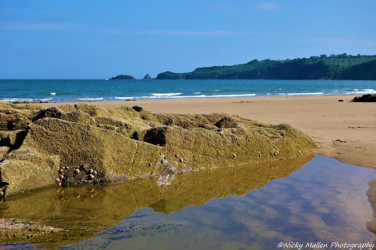 Rock pool reflections in the #heatwave at Coppet Hall looking towards Monkstone and #Saundersfoot. <a href="/ItsYourWales/">It's Your Wales</a> <a href="/ThePhotoHour/">#ThePhotoHour</a> <a href="/StormHour/">#StormHour</a> #Pembrokeshire #Wales #beachlife #HEATWAVE2019 #heatwaveuk
