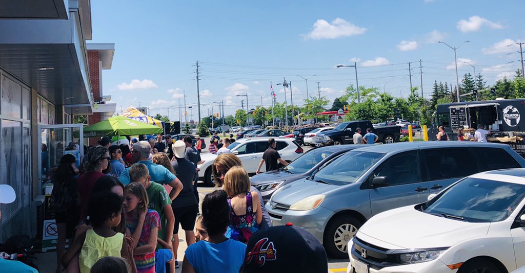 JohnBrayman's tweet photo. @SteveDesroches @menchies_ca @BarrhavenJan @MeehanCarolAnne @barrhavenindy UPDATE: Huge lineup (as expected), but great day for it! #MenchiesBarrhaven #FreeFroYo! https://t.co/5gU9A1wFrz