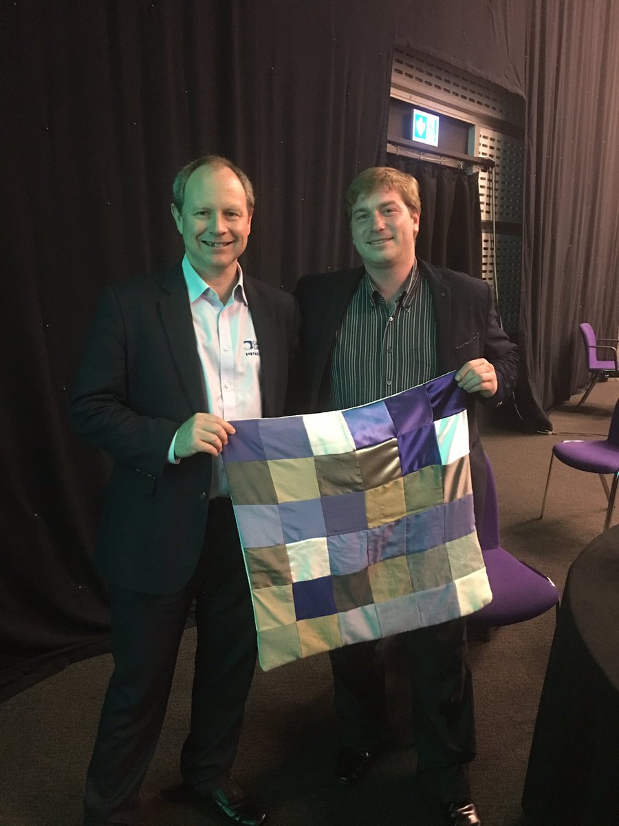SynBioJamesH's tweet photo. Itโs been a busy week, but looking back the bit I enjoyed the most was modelling my @CambConsultants #synbio shirt from @colorifix at #synbitech2019 along with @OrrYarkoni showing off the amazing range of pigments and fabrics they can dye with bacteria! @SynbiCITE @SynBioBeta https://t.co/QEgxjn9UlU