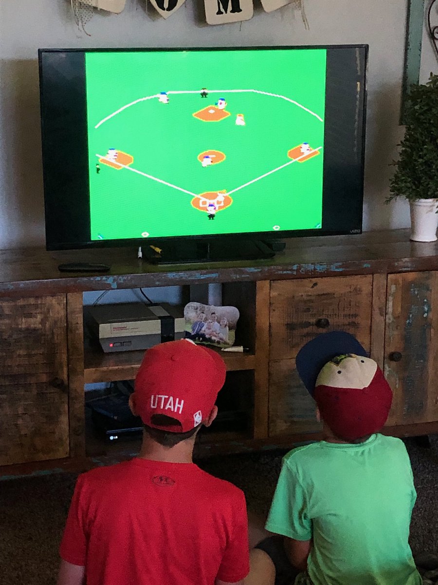 ezebarks's tweet photo. That proud moment when your kids discover the original ⁦@NintendoAmerica⁩ playing RBI Baseball https://t.co/ZF4A6XtTki
