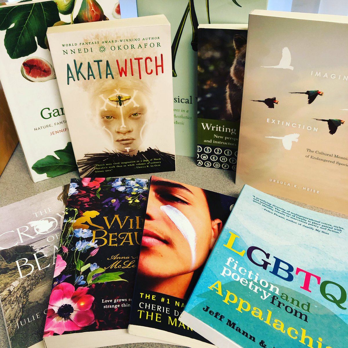 generationwild's tweet photo. This is what happens when you go to environmental literature gatherings while on vacation. Another good haul from #ASLE2019 @ASLE_US #writing #ecofiction. Excited for @Nnedi #afrofuturism, @uheise #extinction, + #books #reading https://t.co/IHuWjDMs3C