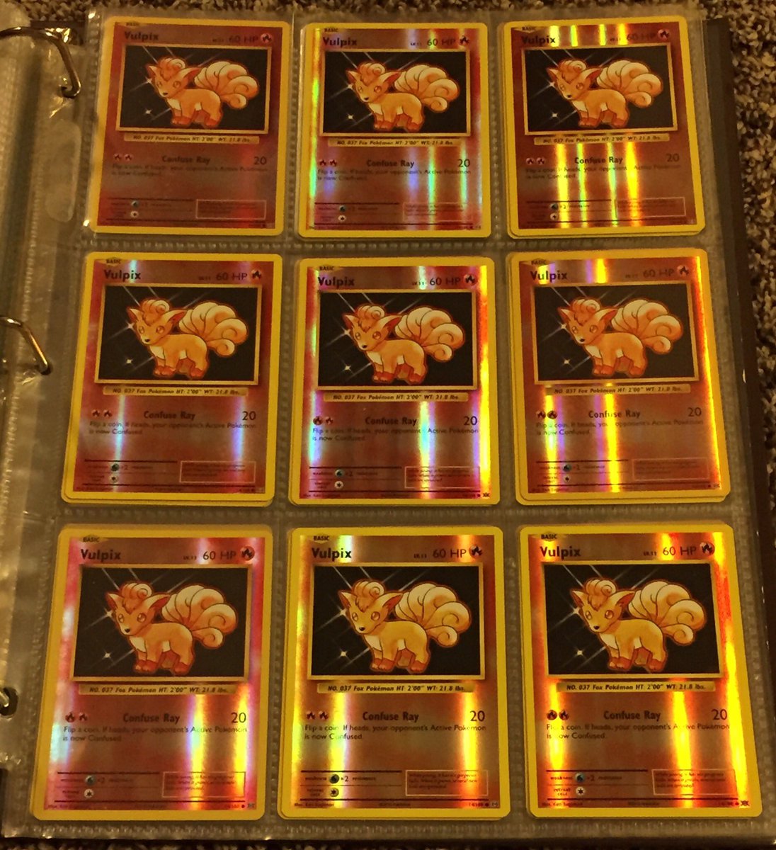 Scarlie_V's tweet photo. I was going through my #Vulpix binder this page is so pretty I #love the #evolutions reverse holo ❤️ #vulpixcard #vulpixlove #pokemon #pokemoncard #pokemonTCG #TCG #Nintendo #collection https://t.co/DcFXFgAAt1