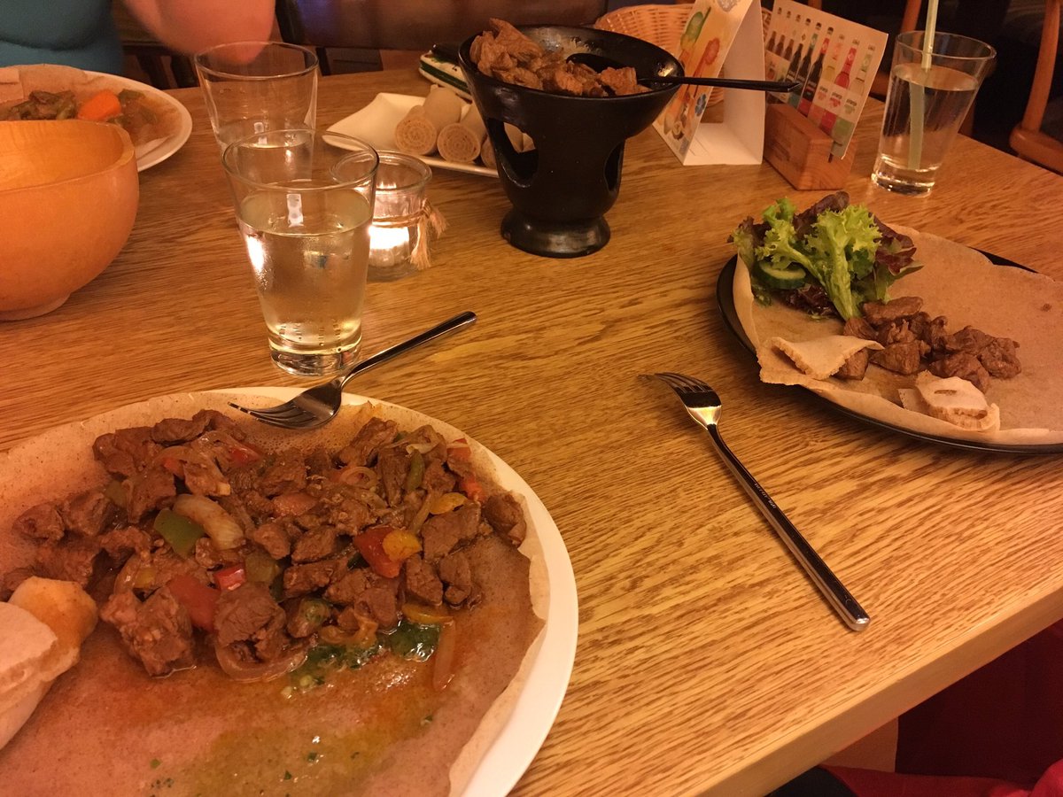 Darkflamewolf's tweet photo. Found a fantastic African restaurant here in downtown by the mall. You get to eat with your fingers! #BreadAsUtensils #FingerLickingGood #MeatIsLove #MeatIsLife #PineappleBeerIsDaBomb #WouldGoAgain https://t.co/YcCa0lVOIe