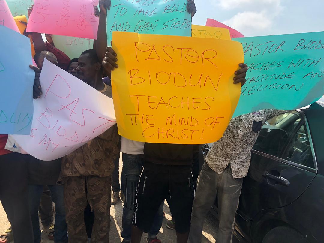 Photos: Pastor Biodun supporters stage protest in front of COZA Abuja