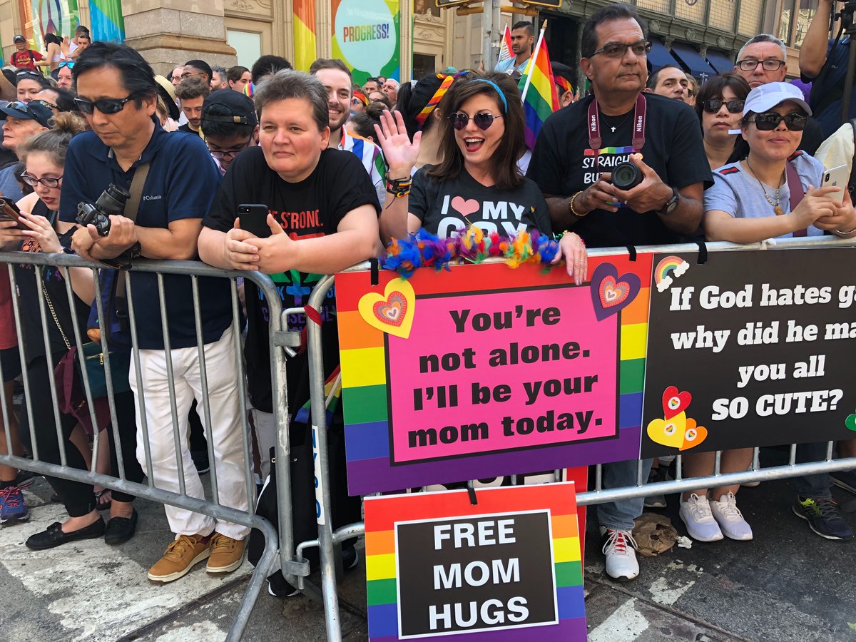CNN's tweet photo. At WorldPride in Manhattan, there are a lot of mothers wearing "Proud mom" shirts and waving signs offering free hugs.

Angela Ghiozzi of Cold Spring, New York, says she’s been coming every year with her son since he came out seven years ago. https://t.co/swMNFMcGia https://t.co/hCTpM7dJL9