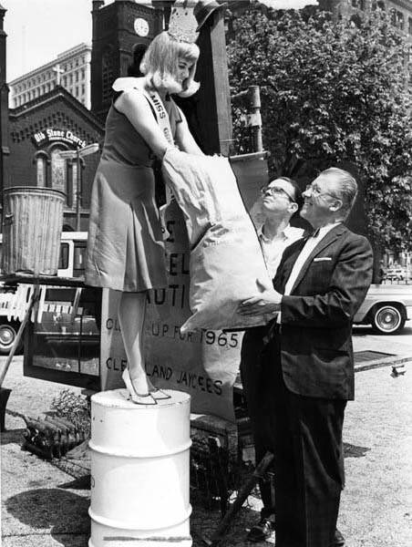 Miss #Cleveland Beauty Queen helps kick off the Cleveland Junior Chamber of Commerce Downtown Beautification Campaign, along with the Director of Public Service, and Secretary of the J.C. May 24, 1965. Source: <a href="/Cleve_Memory/">Cleveland Memory</a>