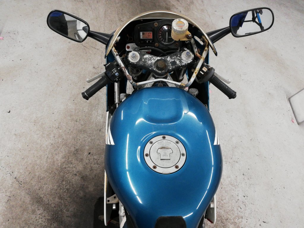 SugoMotorcycles's tweet photo. This is a painful one - who leaves their #NSR250 #MC28 #repsol out in the sun long enough for this to happen?  What a shame. This one has 15000km and is a rank 3. Will still sell for a boatload probably. https://t.co/wpCN1qStoG