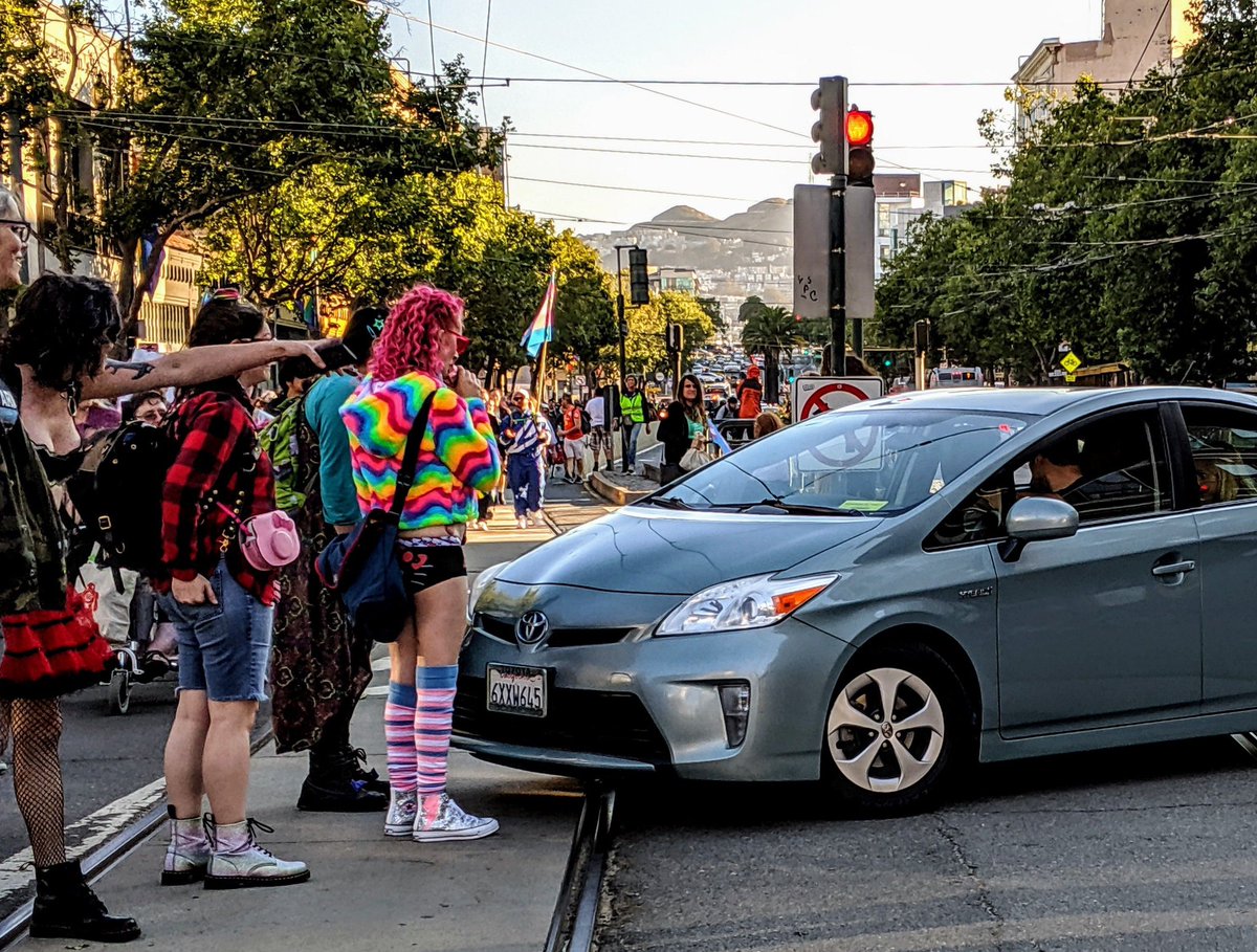 holdenkarau's tweet photo. Family skills: standing in front of cars until they turn around and don’t try to drive through a march. W/ @krisnova @rovetastic #transmarch #sftransmarch #transmarch2019 #sftransmarch #pride #transpride #queer photo by @aimeeble https://t.co/i91AKqWFrg