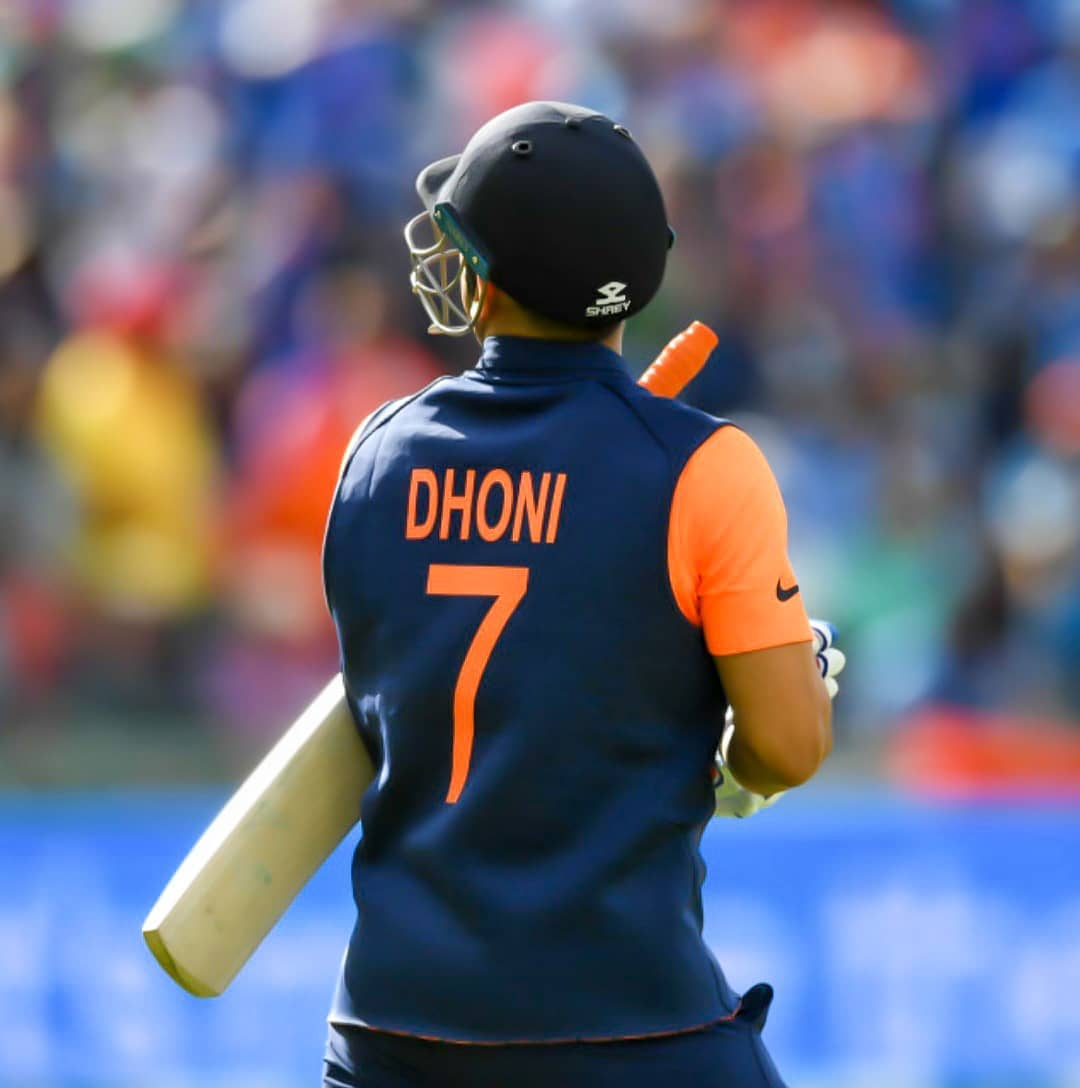 dhoni in orange jersey