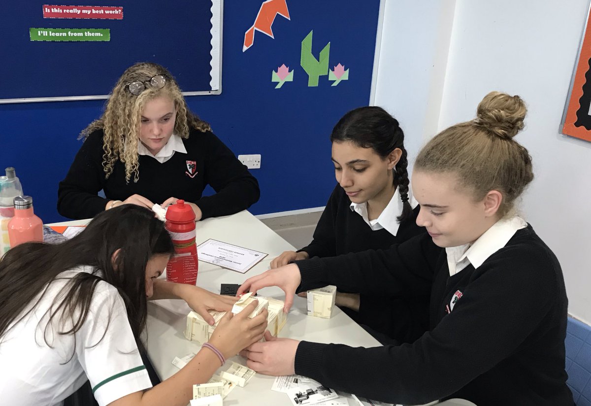 DESCmaths's tweet photo. Our year 8 mathematicians building the first Level 1 Menger sponge. Only 399 to go until we have our very own level 3! Please keep donating any unwanted business cards to the Maths department. @DESCDubai #megamenger #mengersponge #collaboration #fractals https://t.co/VRpr03J1Uy