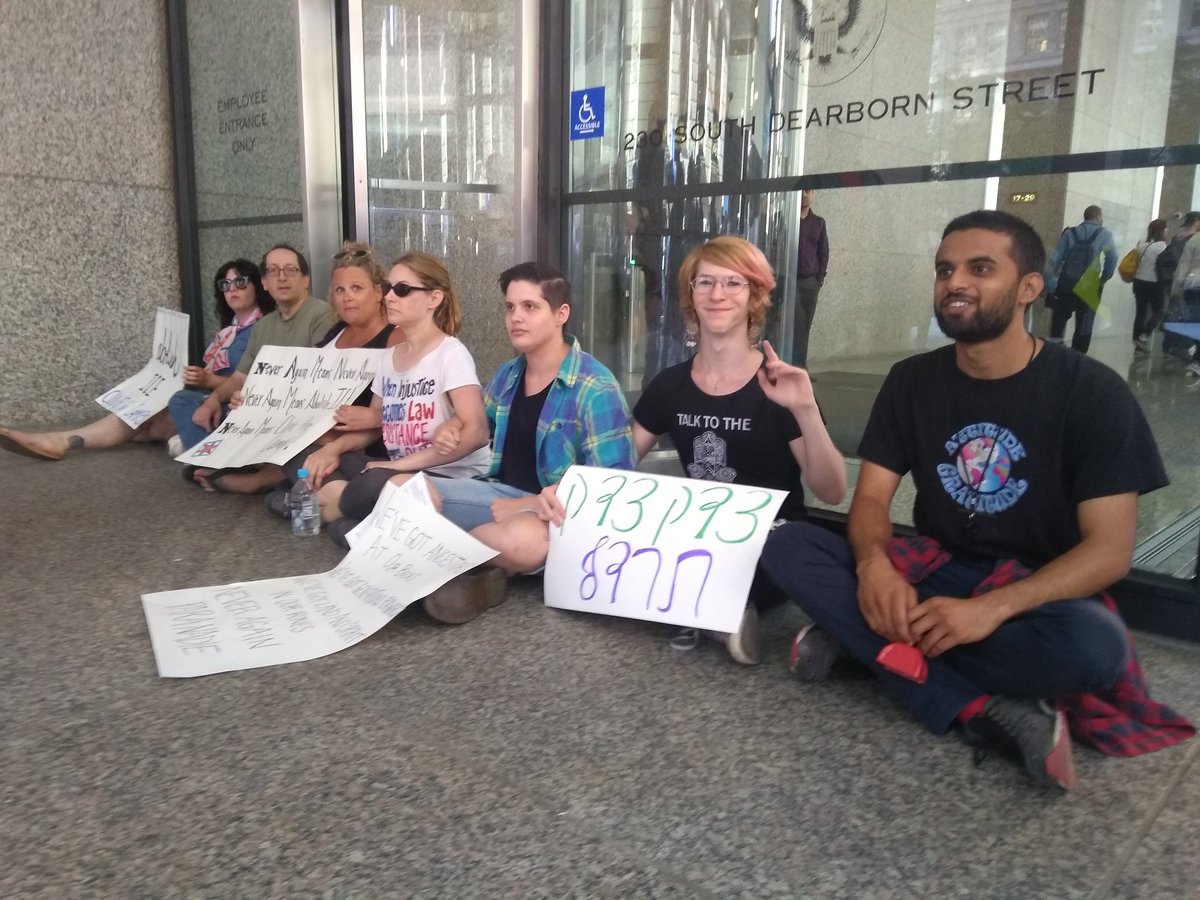 SatActionClub's tweet photo. Protesters are using direct action to block the entrance and exits of the Federal Building in #Chicago #JewsAgainstICE #EndUSConcentrationCamps #NeverAgainMeans https://t.co/ltUbRLA5Sa