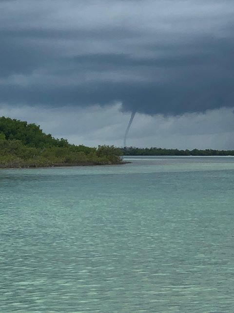 NWSKeyWest's tweet photo. Great shots of a waterspout off Marvin Key earlier this afternoon by Lenore Baker and Lyndsay Graham! This one lasted approximately 10-15 minutes and marks the 3rd "waterspout day" (number of days we received reports) so far in July.
#flwx #FLKeys #KeyWest #MarvinKey #waterspout https://t.co/arAHVcFJ7D