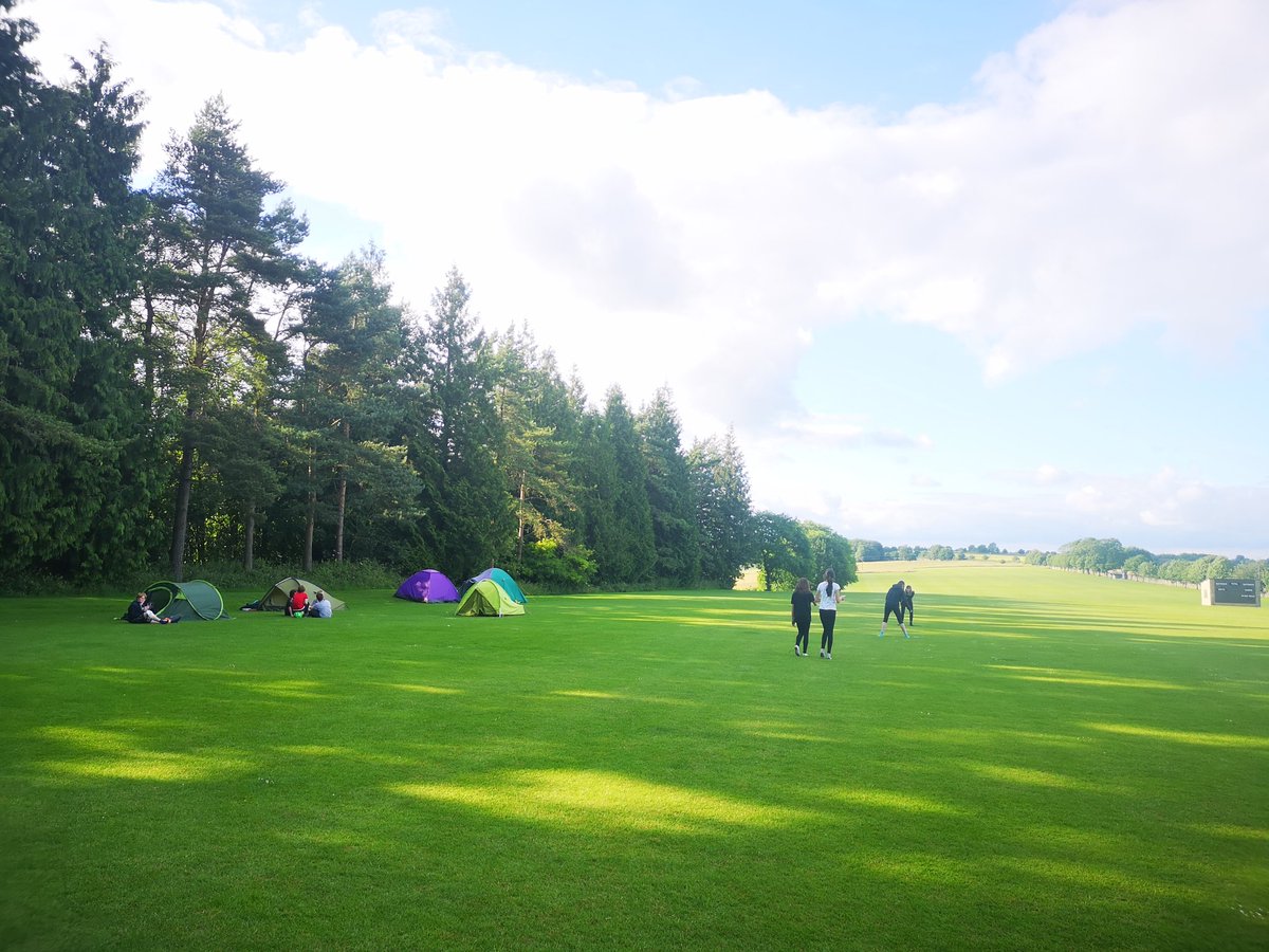 BrealyAmanda's tweet photo. Year 7 pupils @RendcombCollege trekked around the #Cotswolds today, all ending up pitching their tents 'up top' at school. They are now playing cricket before cooking their supper. Another busy day tomorrow with water sports & orienteering. #outdooreducation #stunningsetting https://t.co/JFYXIYfyXx