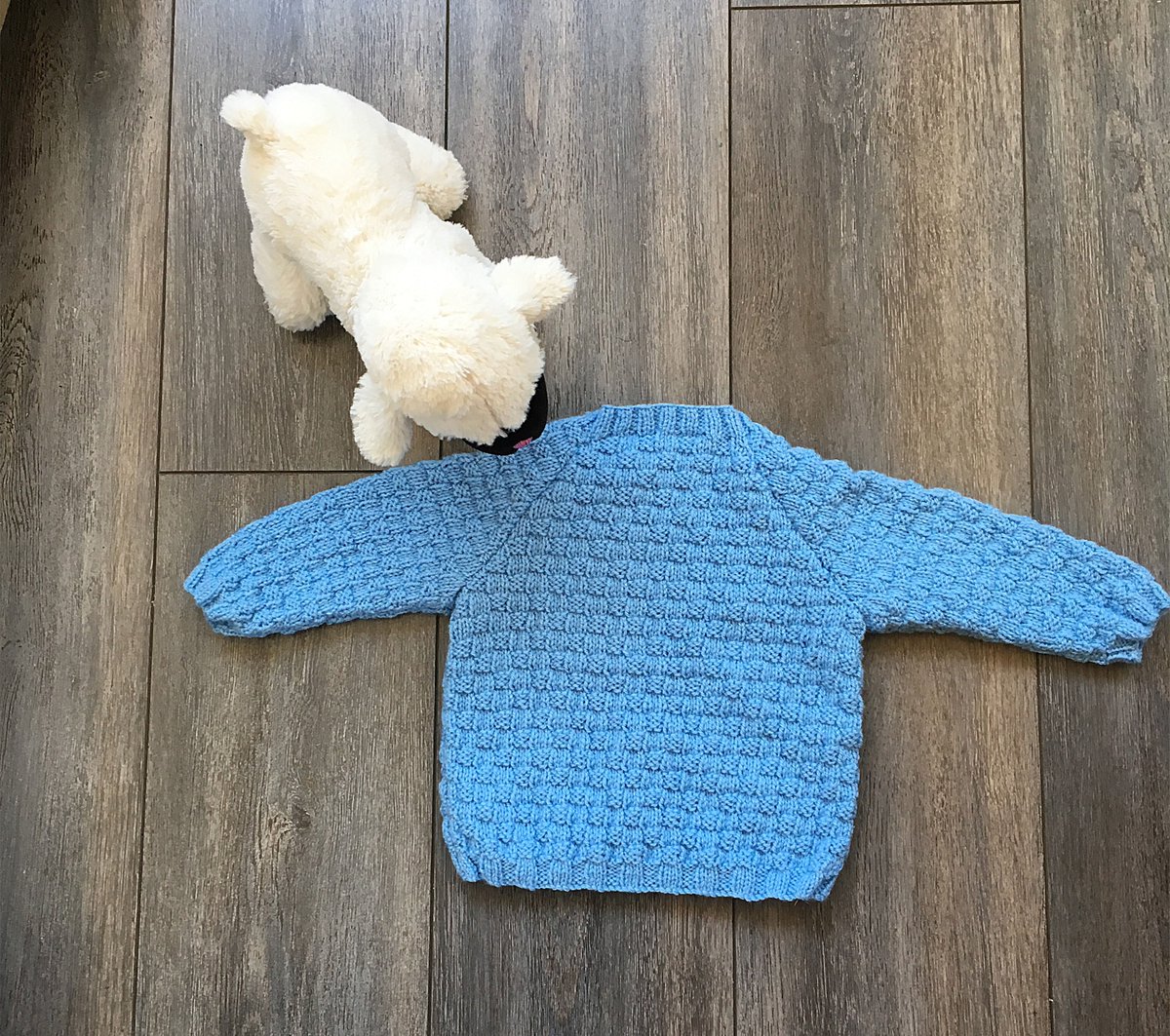 Listed today on …ttishknitwearforkidsandgrownups.co.uk and scottishknitwearforkidsandgrownups.com - hand knitted baby boy jumper to fit age 6 - 12 months Front opening on each side of neck to slip over little heads #womeninbiz #creativebizhour #shopscotland #QueenOf  #MondayMotivaton #TheCraftingHouse #wnukrt