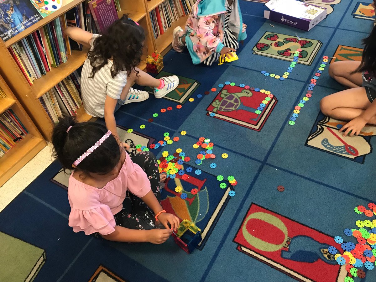 LindaAKMiller's tweet photo. Programming the Bee Bots at #ecvsummersteam https://t.co/C11oXwxnBL