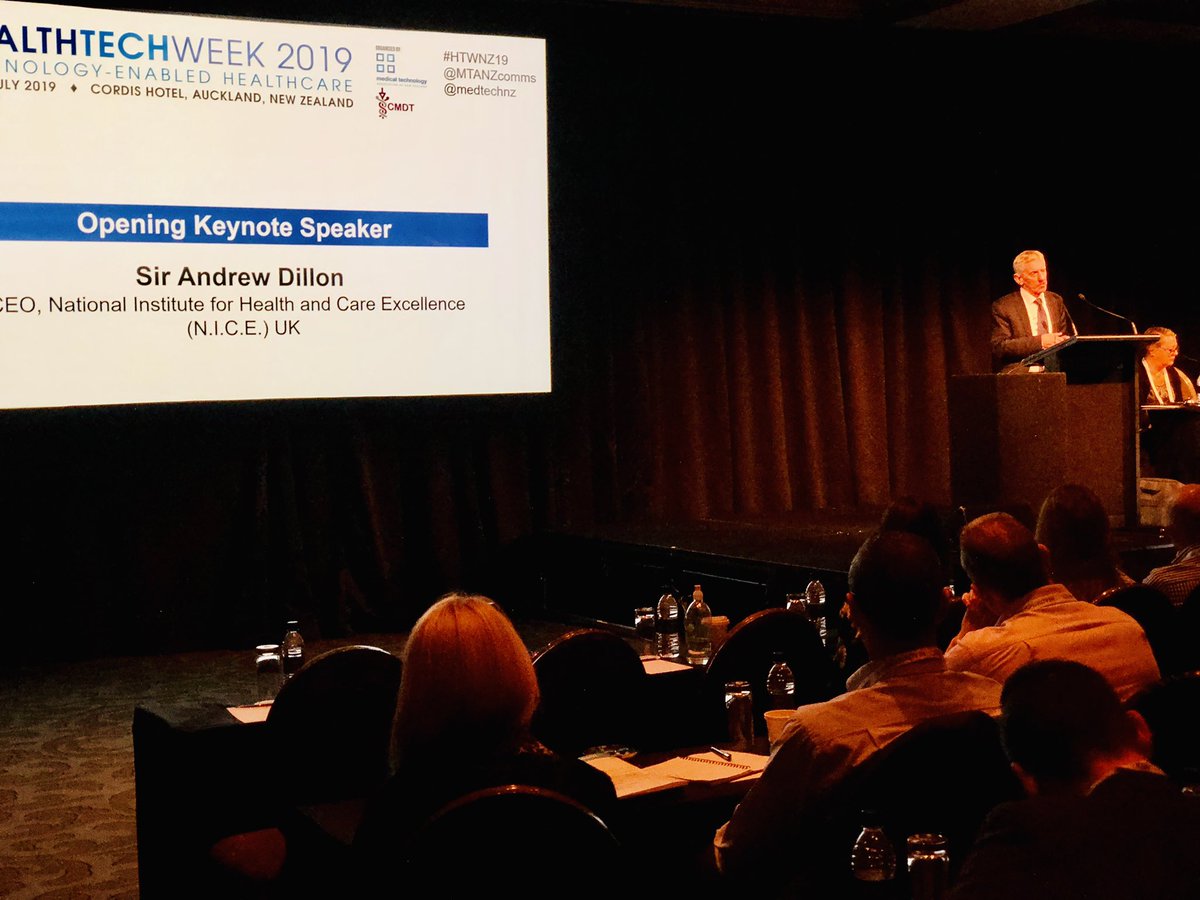 VentoSteve's tweet photo. Sir Andrew Dillon from NICE UK. https://t.co/a0lJeog2oE top trending question; “Do you see a conflict if NICE had a remit to negotiate detailed-pricing alongside its role in assessing technology? (ie. if NICE acted like PHARMAC)” #htwnz19 @MTANZcomms @MedtechNZ https://t.co/G7BF1rXFMm