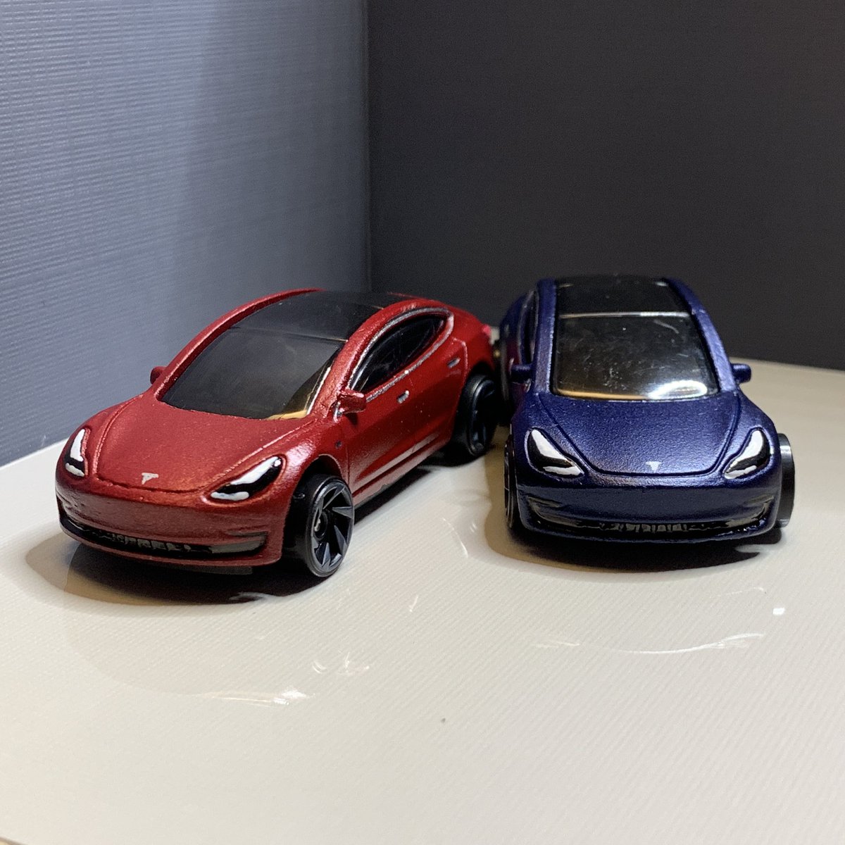 jenstreet's tweet photo. [1 of 2] A preview of each color that I’ll be offering. 🎉🎨  It’ll still be awhile before they’ll be available. I promise, I’m hurrying, peeps! #Tesla #Model3 #TeslaModel3 #HotWheelsCustom #MultiCoatRed #MSM #MidnightSilverMetallic #MetallicBlue #EclipseBlack https://t.co/nNpakojH2C
