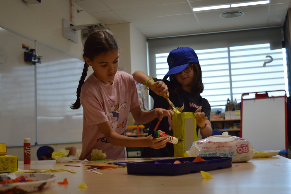 ASBEnglish's tweet photo. Yesterday, A2 students made brightly colored birdhouses out of recycled materials with Ms. Lide. They look so cozy and pretty! https://t.co/mDQthGZu7Y